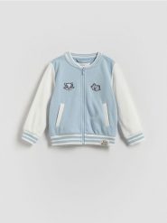 Bluza Kicia Kocia - jasnoniebieski. Niebieskie bluzy i bluzki niemowlęce Reserved, bez wzorów, z bawełny, bez ramiączek, bez kaptura. Za 69.99 zł.