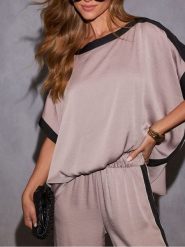 Milan Kiss Bluzka w kolorze jasnoróżowo-czarnym rozmiar: XL. Różowe bluzki damskie Milan Kiss, xl, bez wzorów, bez kołnierzyka, bez ramiączek. Za 130.99 zł.