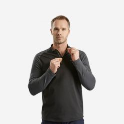 Koszulka turystyczna męska z długim rękawem Quechua SH100 Warm. Czarne koszulki męskie z długim rękawem QUECHUA, m, z elastanu. Za 59.99 zł.