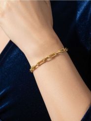 Bransoletka łańcuszkowa - złoty. Żółte bransoletki damskie Sinsay, złote. Za 9.99 zł.