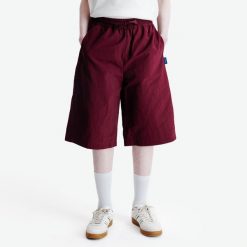 Bermudy męskie Heritage. Fioletowe szorty męskie Decathlon, bez wzorów, z dresówki. Za 89.99 zł.