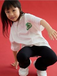 T-shirt Boston Celtics NBA - złamana biel. Koszulki dziewczęce Reserved, bez wzorów, z bawełny, bez ramiączek. W wyprzedaży za 35.99 zł.