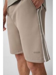Guess Spodnie materiałowe 183578 Zielony Bermuda Fit. Zielone spodnie materiałowe męskie Guess, z aplikacjami, z materiału. Za 344.99 zł.