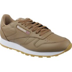 Brązowe Buty Reebok Classic Lthr M CN5768. Brązowe buty sportowe na co dzień męskie Reebok, z materiału, bez zapięcia, reebok classic. W wyprzedaży za 379.00 zł.