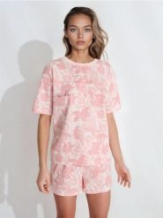 Bawełniana piżama dwuczęściowa z nadrukiem w kwiaty - różowy. Czerwone piżamy damskie Sinsay, l, bez wzorów, z bawełny, bez ramiączek. Za 39.99 zł.