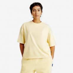Koszulka oversize damska typu Crop. Żółte t-shirty damskie Decathlon, xl, bez wzorów, z bawełny, bez kołnierzyka. Za 52.49 zł.