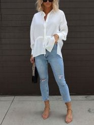 Milan Kiss Bluzka w kolorze białym rozmiar: S. Białe bluzki damskie Milan Kiss, s, bez wzorów, z bawełny, bez kołnierzyka, bez ramiączek. Za 152.99 zł.