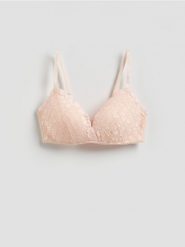 Modulowany biustonosz z koronką - kremowy. Białe biustonosze Reserved, bez wzorów, z dzianiny. Za 69.99 zł.