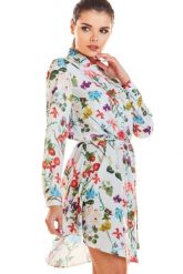 Koszulowa sukienka w kwiaty szmizjerka z kołnierzykiem i paskiem ecru. Sukienki damskie Sukienki.shop, do pracy, na wiosnę, bez wzorów, biznesowe, bez kołnierzyka, bez ramiączek, koszulowe. Za 169.00 zł.