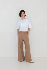 SPODNIE AMBER TAUPE M - Flawless. Żółte spodnie materiałowe damskie Flawless, bez wzorów, z gumy, klasyczne. Za 297.00 zł.