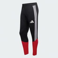 Spodnie treningowe Niemcy 26 Tiro. Czarne spodnie sportowe męskie Adidas, z materiału. Za 279.00 zł.