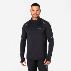 Bluza do biegania męska Kiprun Run Flow Warm 1/2 zip ocieplana. Czarne bluzy bez kaptura męskie KIPRUN, l, z materiału. Za 99.99 zł.
