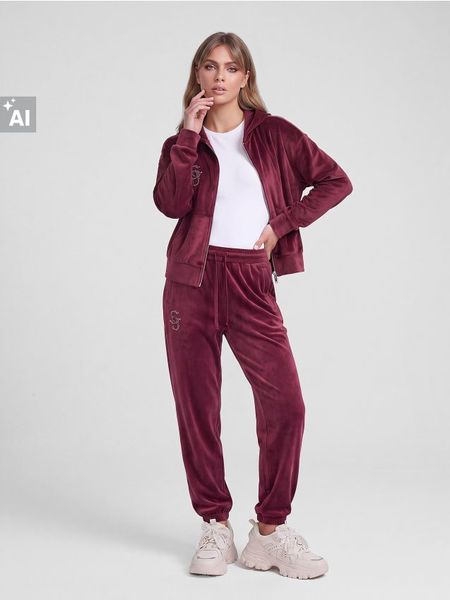 Welurowe spodnie ze ściągaczami - czerwony. Czerwone spodnie materiałowe damskie Sinsay, bez wzorów, z weluru. Za 39.99 zł.