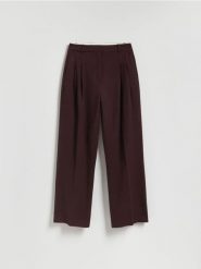 Spodnie w kant z wełną - ciemnofioletowy. Fioletowe spodnie materiałowe damskie Reserved, bez wzorów, z tkaniny. Za 199.99 zł.