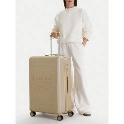 Walizka duża Reebok. Żółte walizki Reebok, bez wzorów, duże. Za 349.99 zł.