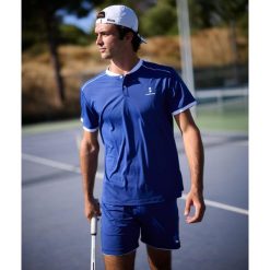 Koszulka polo męska Pro Flex. Niebieskie koszulki polo męskie NORDICDOTS, l, bez wzorów, bez ramiączek. Za 360.00 zł.