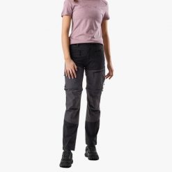 Spodnie Wędrówki damska Swedemount Lofoten Stretch Zip-Off Pants wodoodporna. Czarne spodnie dresowe damskie SWEDEMOUNT, bez wzorów, z tkaniny. Za 449.99 zł.