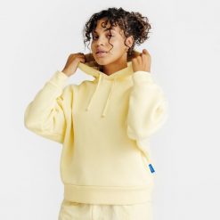 Bluza z kapturem damska Elementals. Żółte bluzy z kapturem damskie Decathlon, s, z bawełny. Za 179.99 zł.