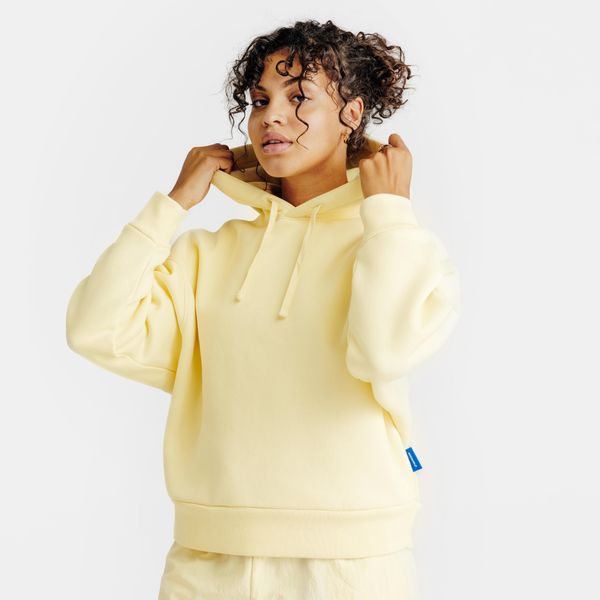 Bluza z kapturem damska Elementals. Żółte bluzy z kapturem damskie Decathlon, s, z bawełny. Za 179.99 zł.