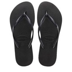 Klapki Havaianas Model 4000030 Kolor Czarny. Czarne klapki damskie Havaianas, bez wzorów, z gumy, bez obcasa. Za 72.00 zł.