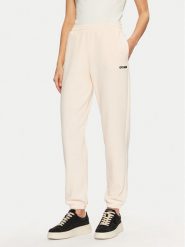 Guess Spodnie dresowe V5RB02 KCLD1 Écru Regular Fit. Spodnie dresowe damskie Guess, m, z aplikacjami, z bawełny. Za 179.99 zł.