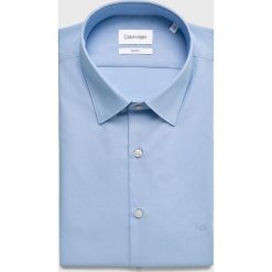 Calvin Klein - Koszula. Niebieskie koszule męskie CALVIN KLEIN, bez wzorów, z bawełny, bez kołnierzyka, bez ramiączek. Za 299.90 zł.