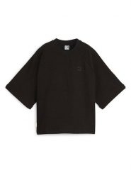 Puma Koszulka "Infuse" w kolorze czarnym rozmiar: L. Czarne bluzki damskie Puma, l, bez wzorów, bez kołnierzyka, bez ramiączek. Za 113.10 zł.