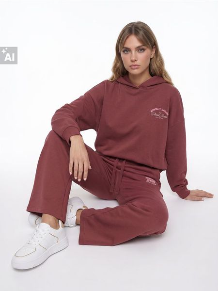 Spodnie dresowe wide leg z bawełną - pomarańczowy. Brązowe spodnie sportowe damskie Sinsay, l, z bawełny. Za 39.99 zł.