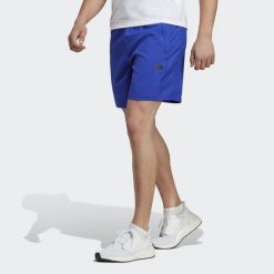 Spodenki krótkie treningowe męskie adidas Essentials. Czarne szorty męskie Adidas, z materiału, bez kołnierzyka. Za 96.00 zł.