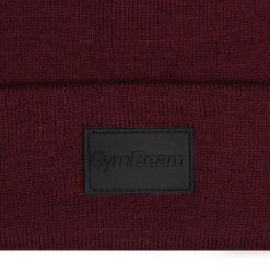 Czapka unisex z akrylowej dzianiny bordowa Polar. Czerwone czapki męskie GYMBEAM, na zimę, bez wzorów, z dzianiny, sportowe. Za 42.90 zł.