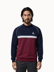 Bluza Le Coq Sportif Tri. Niebieskie bluzy bez kaptura męskie Le Coq Sportif, bez wzorów, z materiału, sportowe, bez kołnierzyka, bez ramiączek. Za 453.50 zł.