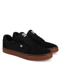 Trampki męskie DC Shoes Anvil. Czarne trampki i tenisówki męskie DC Shoes, bez wzorów, z materiału, bez zapięcia. Za 279.99 zł.