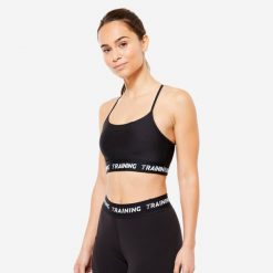 Stanik sportowy Decathlon. Czarne biustonosze sportowe damskie DOMYOS, bez wzorów, z elastanu. Za 49.99 zł.