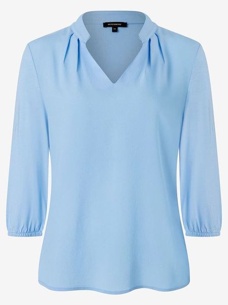 More & More Bluzka w kolorze błękitnym rozmiar: 34. Niebieskie bluzki damskie MORE & MORE, s, bez wzorów, z wiskozy, klasyczne, bez kołnierzyka, bez ramiączek. Za 74.28 zł.