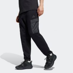 Spodnie męskie ADIDAS. Spodnie materiałowe męskie Adidas, bez wzorów, z bawełny. W wyprzedaży za 199.99 zł.