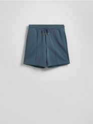 Szorty comfort z przeszyciami - granatowy. Niebieskie szorty męskie Reserved, z bawełny, bez kołnierzyka. W wyprzedaży za 79.99 zł.