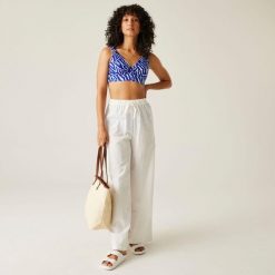 Góra od stroju kąpielowego damska Paloma. Niebieskie bikini damskie Regatta, bez wzorów. W wyprzedaży za 94.90 zł.