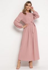 Ciemnoróżowa Rozkloszowana Sukienka Maxi z Plisowanym Dołem i Wiązanym Paskiem Nollira. Czerwone sukienki damskie Born2be, bez wzorów, eleganckie, bez kołnierzyka, bez ramiączek, maxi, plisowane. W wyprzedaży za 111.99 zł.