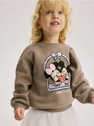 Bluza Mickey Mouse - kremowy. Białe bluzy i bluzki niemowlęce Reserved, bez wzorów, z bawełny, bez ramiączek, bez kaptura. W wyprzedaży za 25.99 zł.