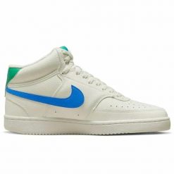 Obuwie Sportowe Damskie Nike 105. Białe buty sportowe na co dzień damskie Nike, bez wzorów, z materiału, do koszykówki. Za 221.52 zł.
