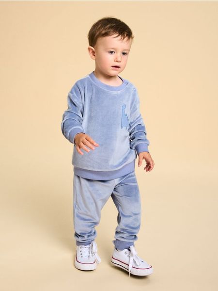 Komplet: bluza i spodnie - niebieski. Niebieskie bluzy i bluzki niemowlęce Sinsay, bez wzorów, bez ramiączek, bez kaptura. Za 29.99 zł.