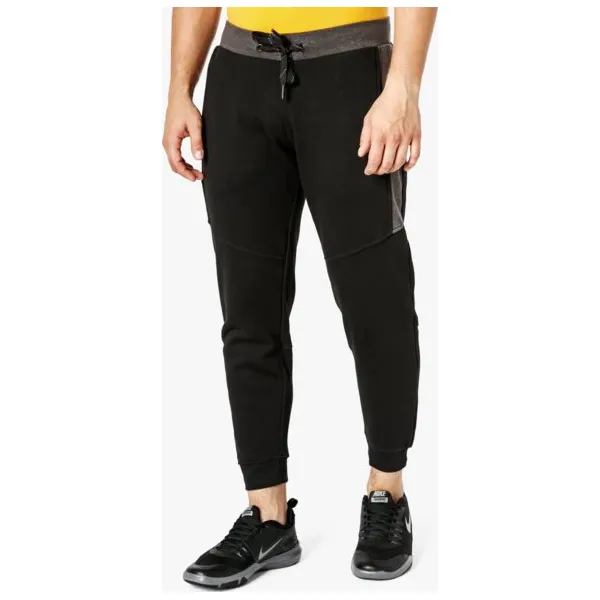 Umbro Spodnie Pyrite , czarny, rozmiar XXL. Czarne spodnie materiałowe męskie Umbro, bez wzorów, z bawełny. W wyprzedaży za 79.99 zł.