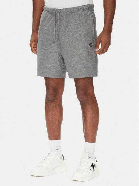 Calvin Klein Jeans Szorty sportowe Premium Terry LV04RC280G Szary Regular Fit. Szare szorty męskie Calvin Klein Jeans, bez wzorów, z bawełny, sportowe. Za 289.99 zł.