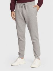 Guess Spodnie dresowe Aldwin Z2YB22 K9V31 Szary Regular Fit. Szare spodnie dresowe męskie Guess, z aplikacjami, z bawełny. Za 169.99 zł.
