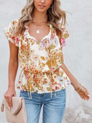 Milan Kiss Bluzka w kolorze kremowym ze wzorem rozmiar: M. Brązowe bluzki damskie Milan Kiss, m, bez wzorów, bez kołnierzyka, bez ramiączek. Za 91.99 zł.