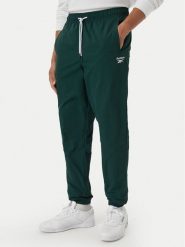 Reebok Spodnie dresowe Mieszko RK25722CCM Zielony ciemny Regular Fit. Zielone spodnie dresowe męskie Reebok, bez wzorów, z dresówki. Za 299.99 zł.
