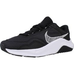 Tenisówki Nike Model Legend Essential 3 Wome Kolor Czarny. Czarne trampki i tenisówki damskie Nike, bez wzorów, z gumy. Za 519.00 zł.