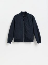 Kurtka bomberka - granatowy. Niebieskie kurtki męskie Reserved, l, bez wzorów, z tkaniny, bez kaptura. Za 199.99 zł.