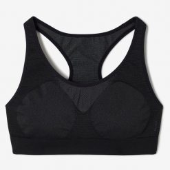 Stanik sportowy Decathlon. Białe biustonosze sportowe damskie KALENJI, bez wzorów, z elastanu. Za 29.99 zł.