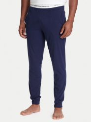 United Colors Of Benetton Spodnie piżamowe 30964F00V Granatowy Regular Fit. Niebieskie piżamy męskie United Colors Of Benetton, m, bez wzorów, z bawełny, bez ramiączek. Za 119.99 zł.